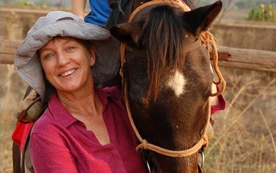 Mandy Retzlaff fled her farm in Zimbabwe with 104 horses she gathered from surrounding land and led them down to safety in Mozambique  in 2002